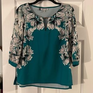 Three-quarter sleeve teal floral blouse